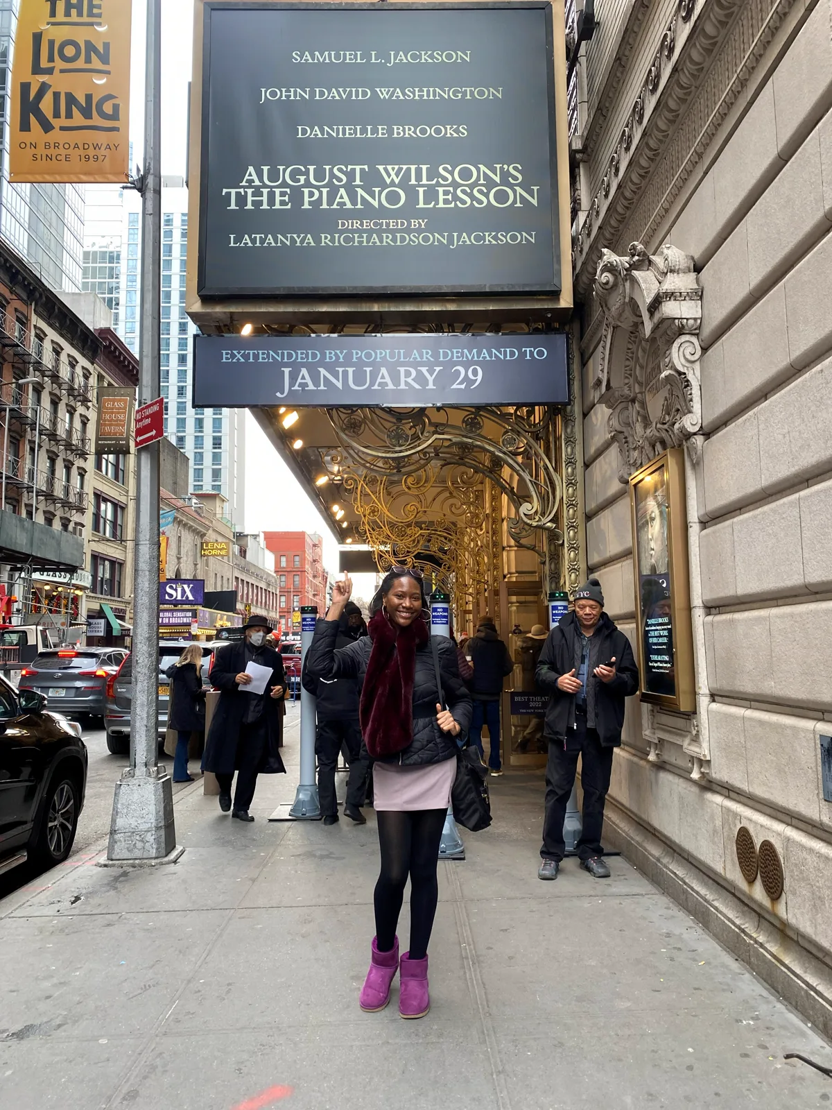 Ahdis on a New York street outside a theatre